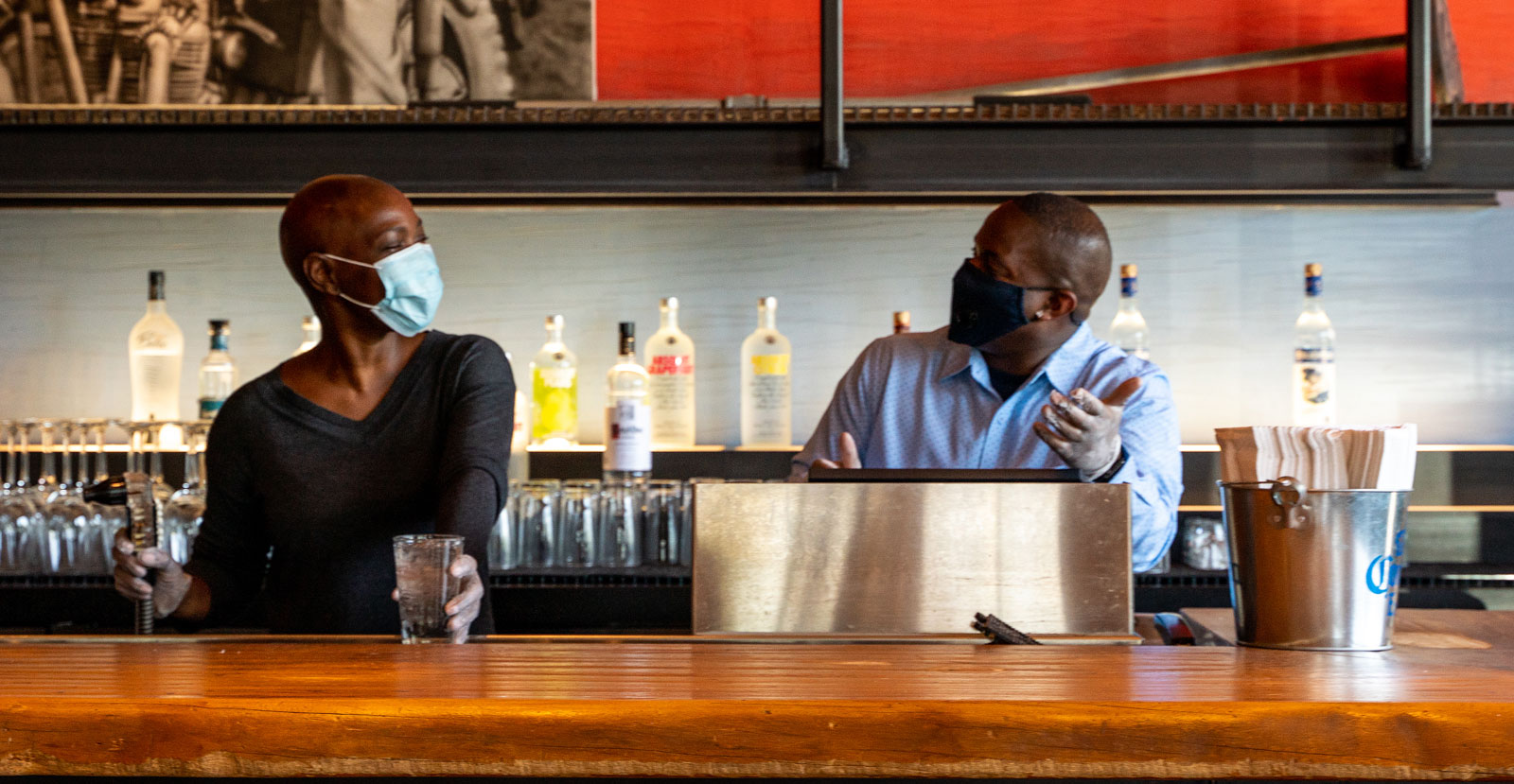 Bartenders conversing