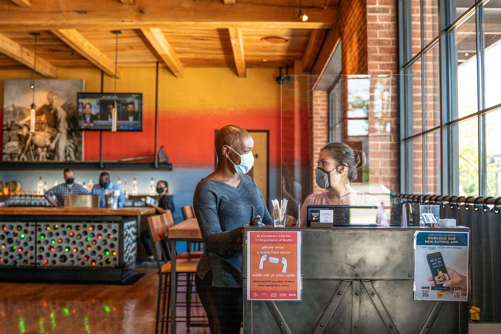 Open Road Grill waiter and hostess talking