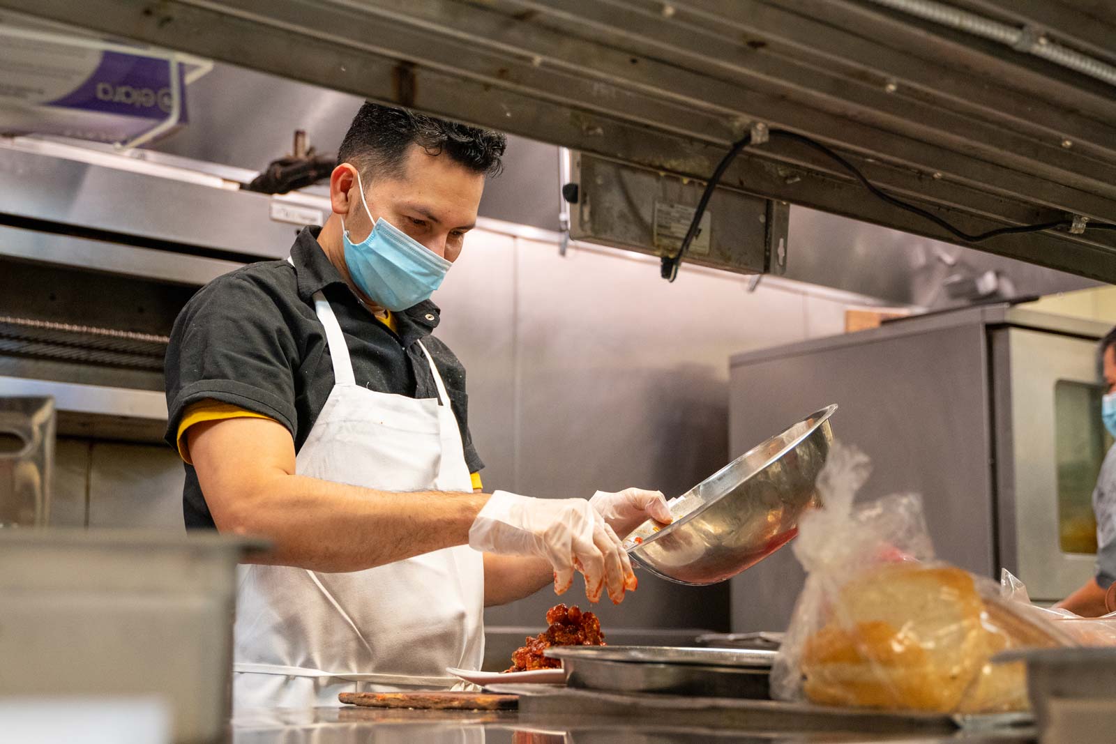 Chef plating a meal